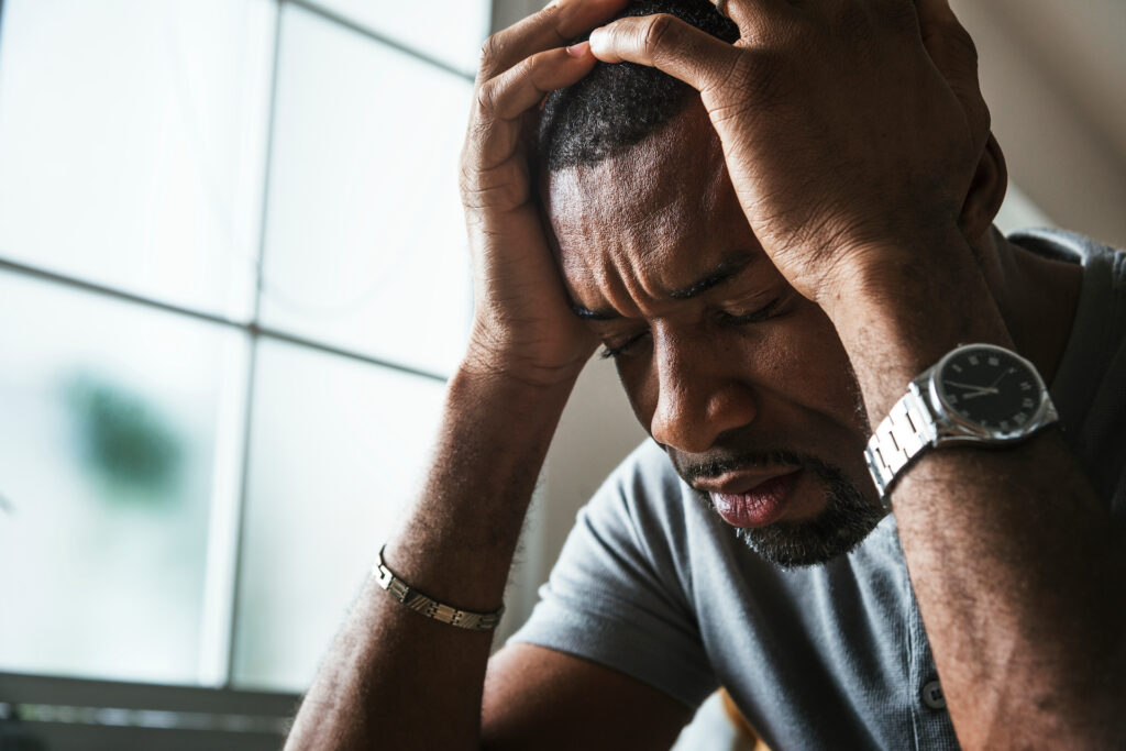 Man feeling stress due to addiction