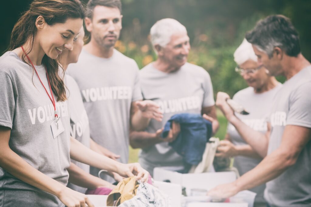 group of people volunteering finding meaning in life