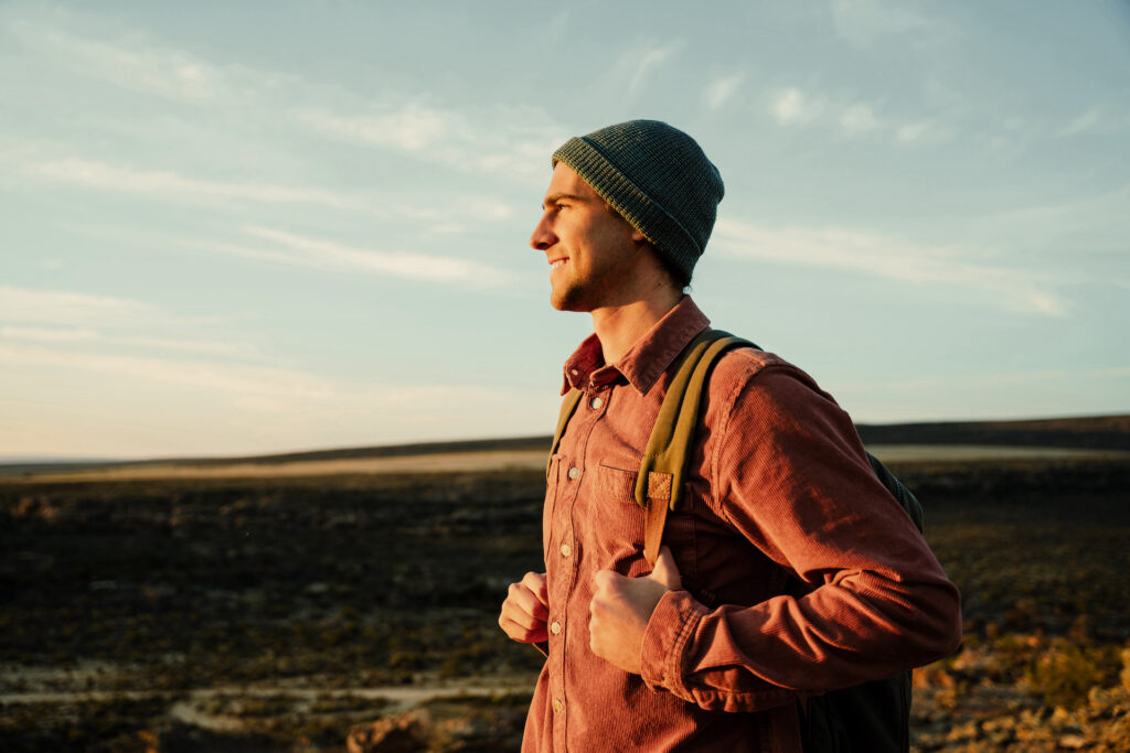 man activating psychological arousal through hiking