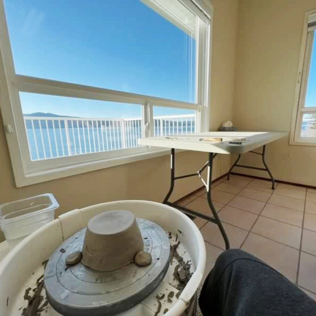 pottery wheel overlooking ocean in a clay workshop