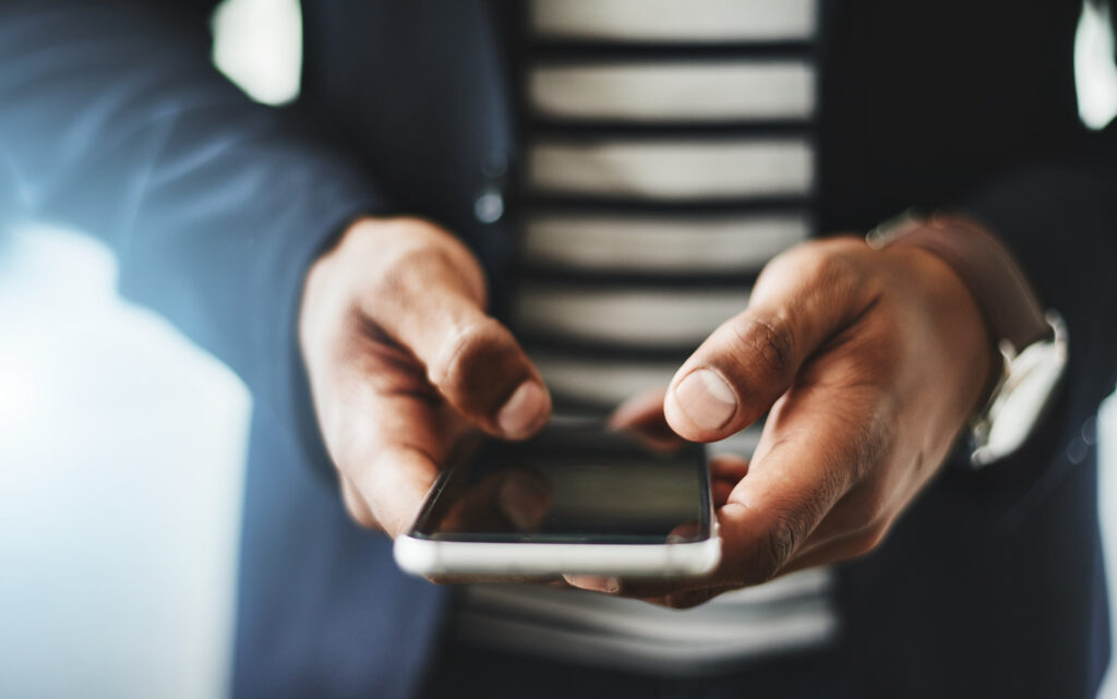 Man on phone doomscrolling