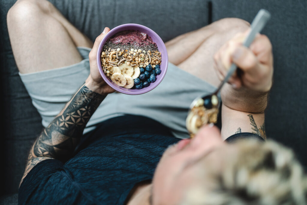 man eating nutrition bowl